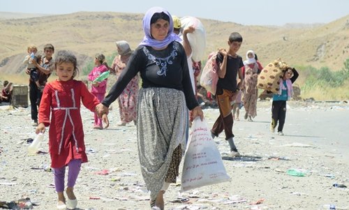 Yezidis fleeing Islamic State fighters