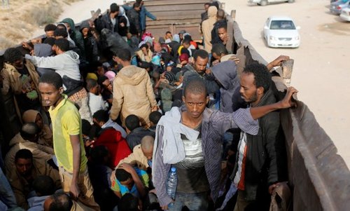 African migrants are transferred to a detention centre