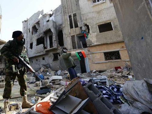 r_of_libyan_pro-government_forces_backed_by_locals_carries_weapon_during__JtHVizg.jpg