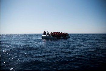 Boat carrying refugees across the English Channel