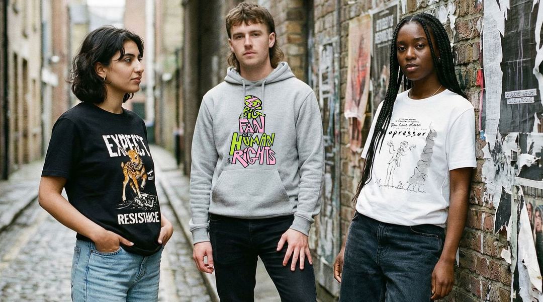 Three people wearing versions t-shirts from the new Amnesty collection