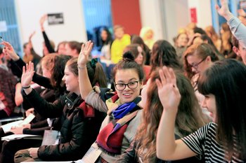 Image of student Amnesty supporters voting at the Student Conference.