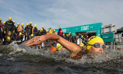 Person swimming at an event