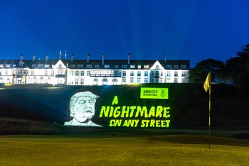 An Amnesty protest banner hung at one of his golf courses depicting President Trump alongside the words 'A nightmare on any street'